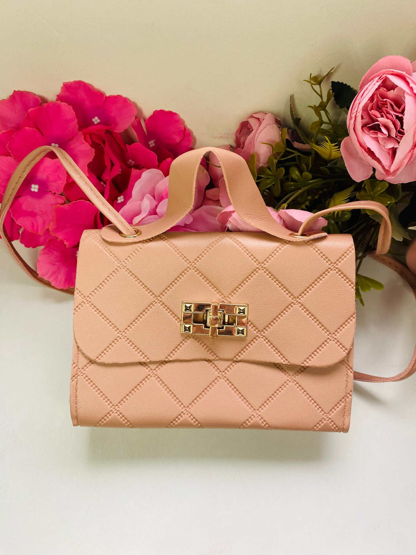 Bolsito de Mano con colgante ❤️