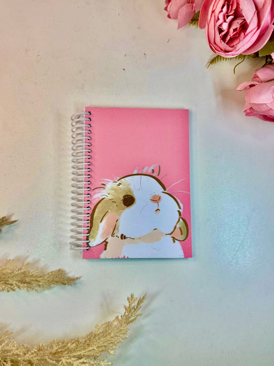 Libreta  pequeña conejito fondo rosa chicle