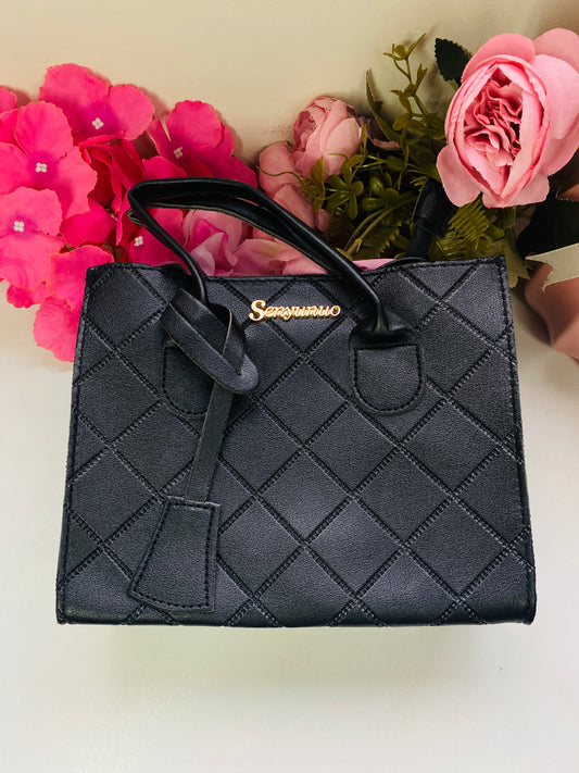 Bolsito de Mano con colgante ❤️